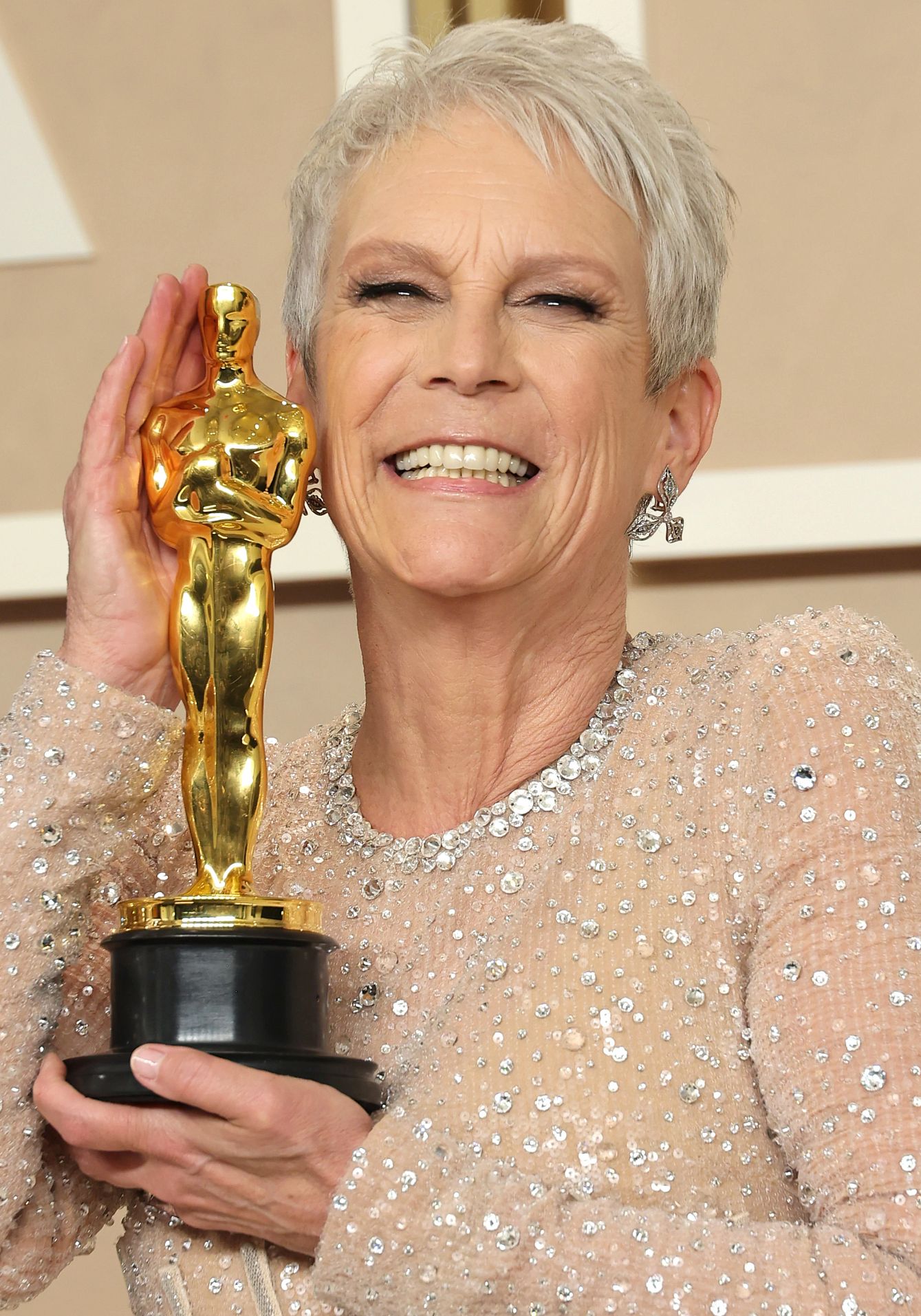The Liberation of Jamie Lee Curtis jamie lee curtis smiling while holding her oscar statue