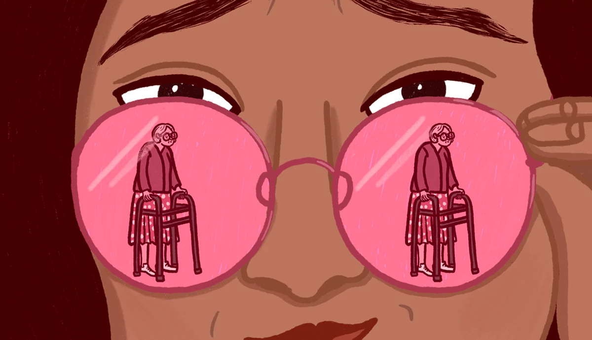 a person wearing pink glasses with a woman using a walker as the reflection