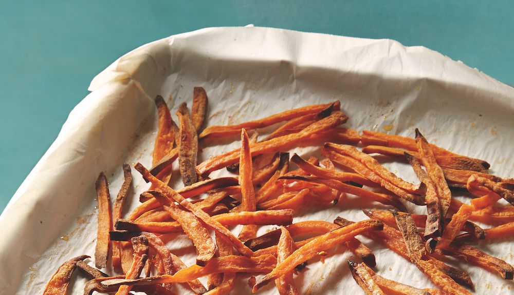 Oven-Roasted Sweet Potato Fries sweet potato fries on a pan