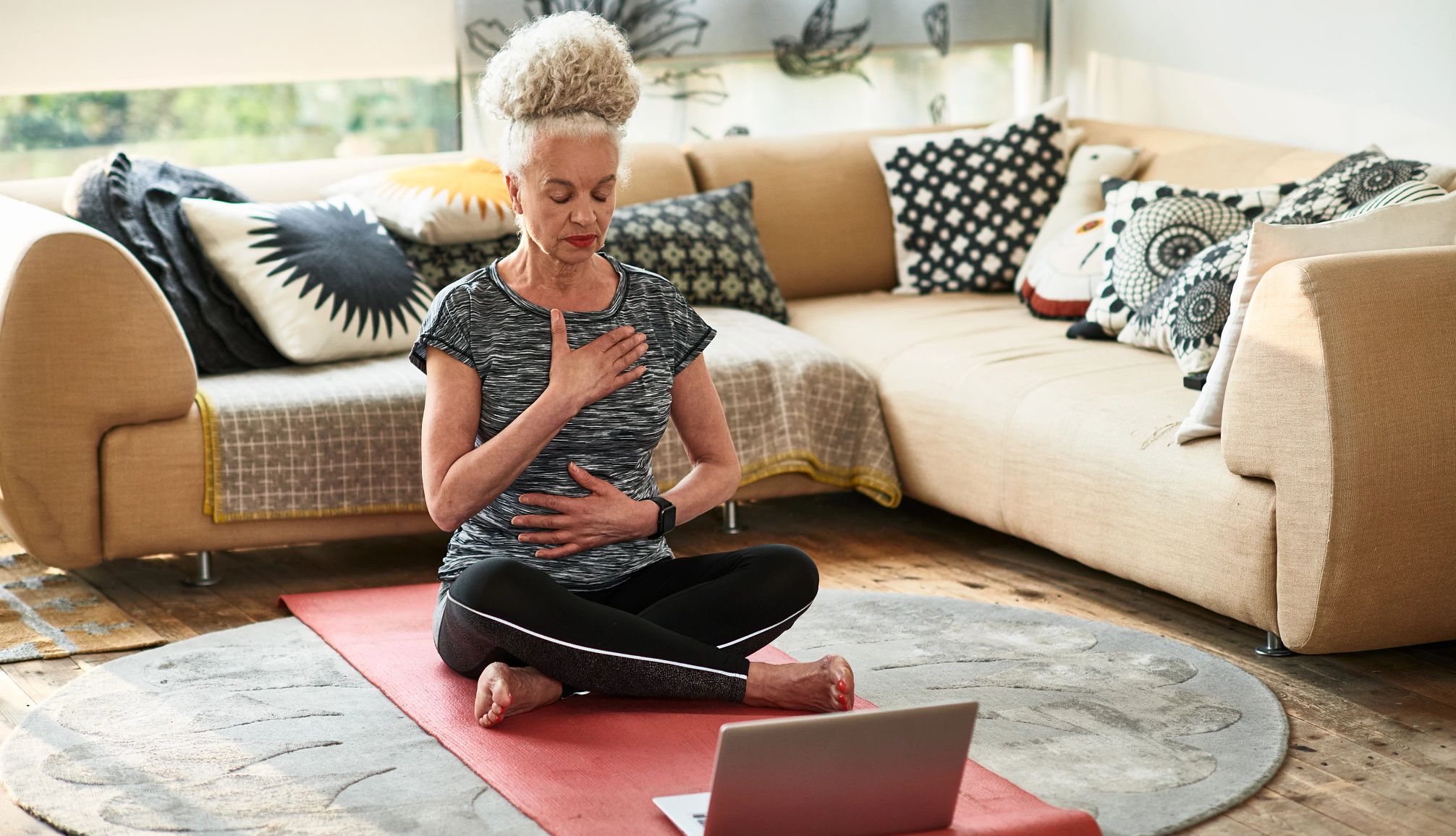 Free Meditation Apps a woman is meditating