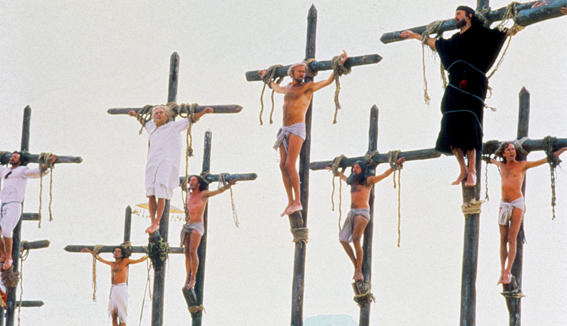 Men hanging from crosses in the film Life of Brian