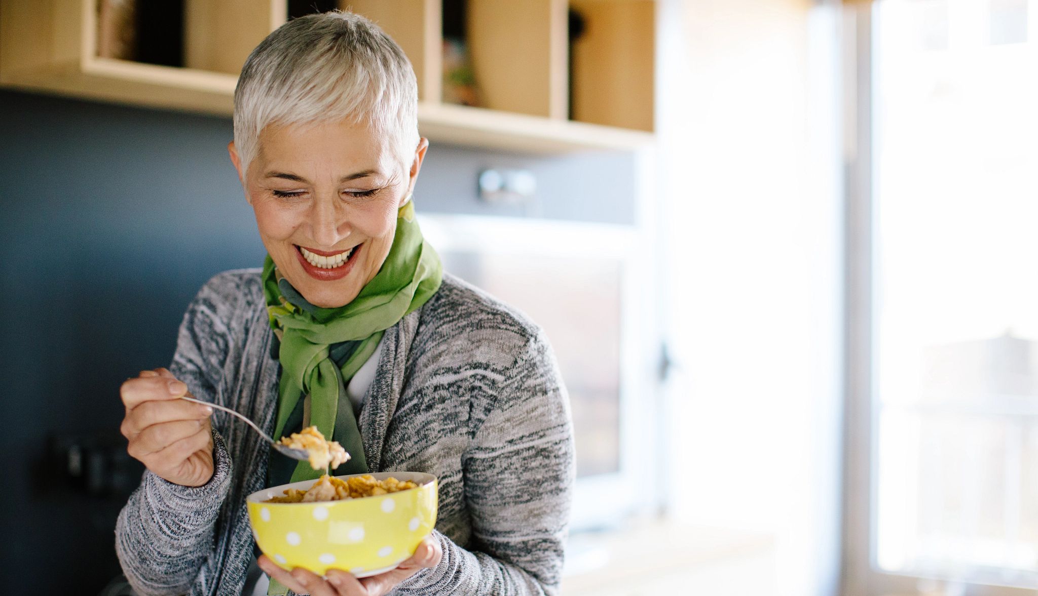 Woman eating breakfast Woman eating breakfast