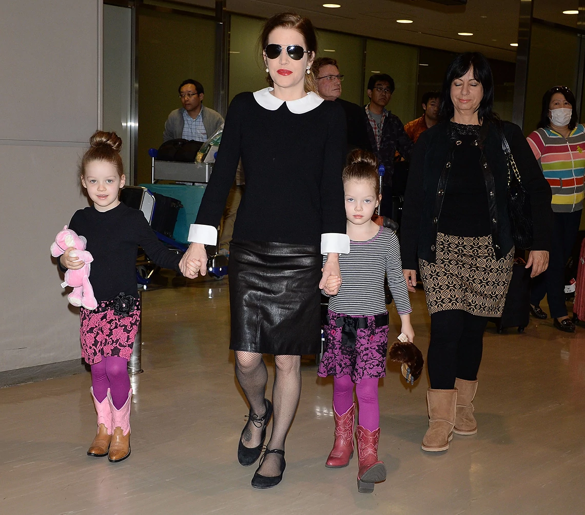 Lisa Marie and her twin daughters, Harper and Finley, in 2014
