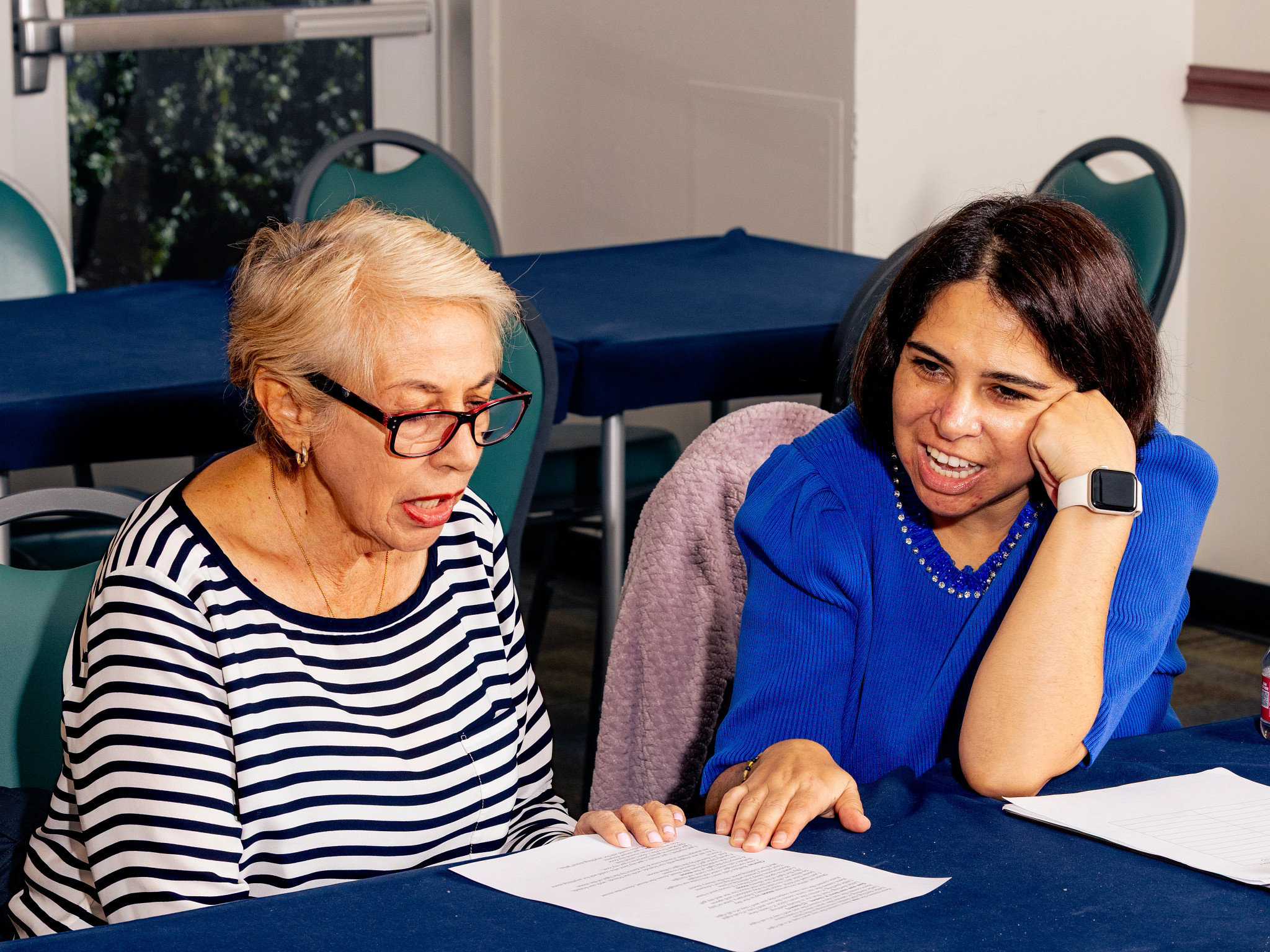 two people singing together
