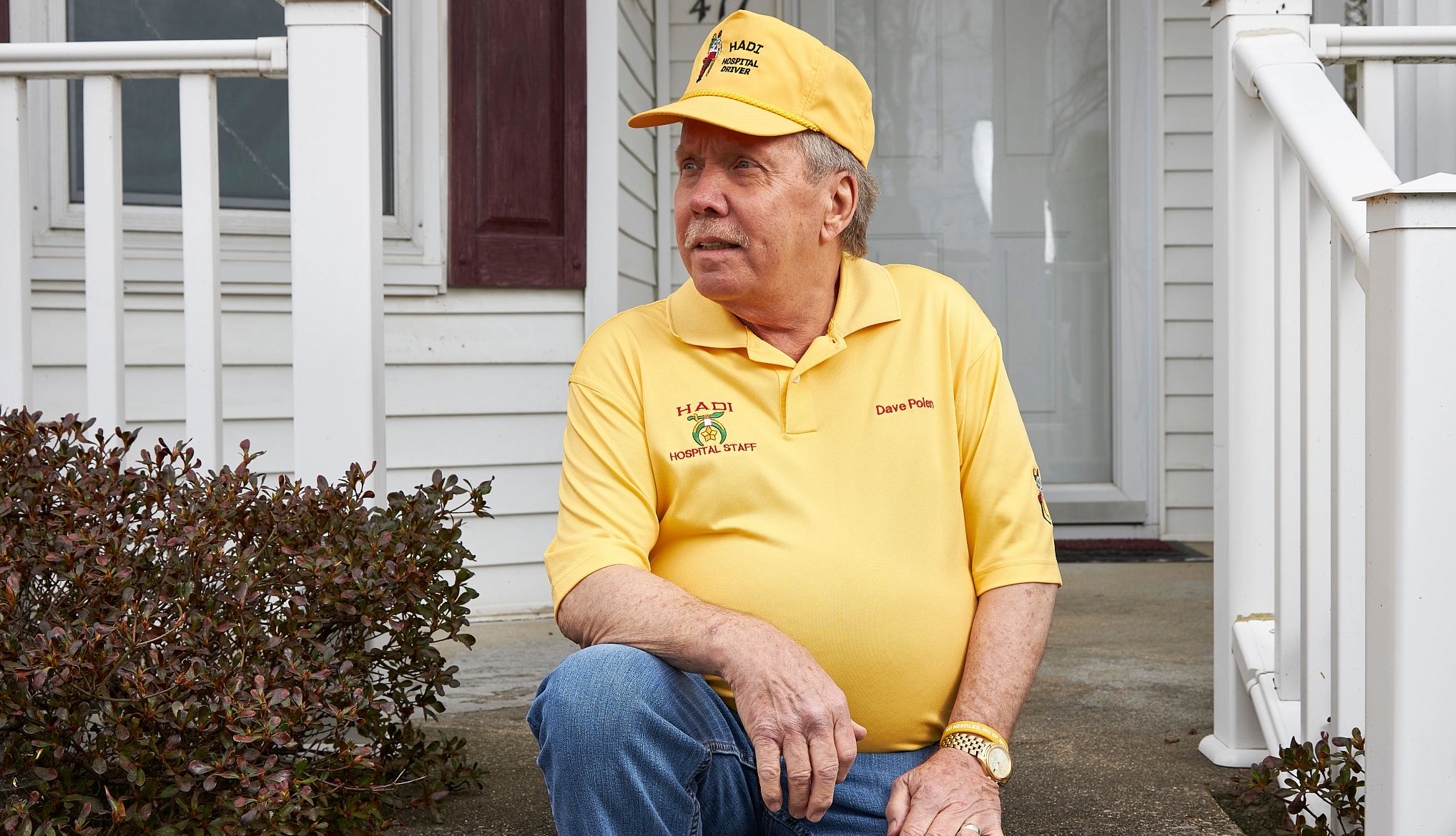 Dave Polen outside his home Dave Polen sitting on porch step of home