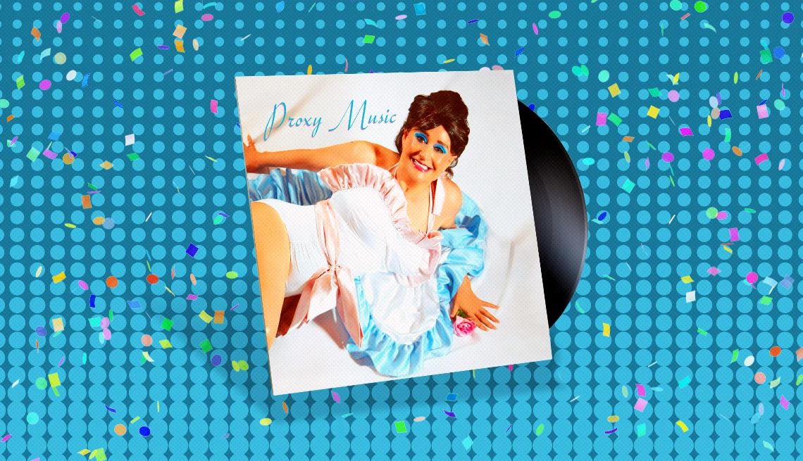 Linda Thompson's “Proxy Music” Album cover with record sticking out of it and words Proxy Music with woman laying down on cover; blue background with confetti on it