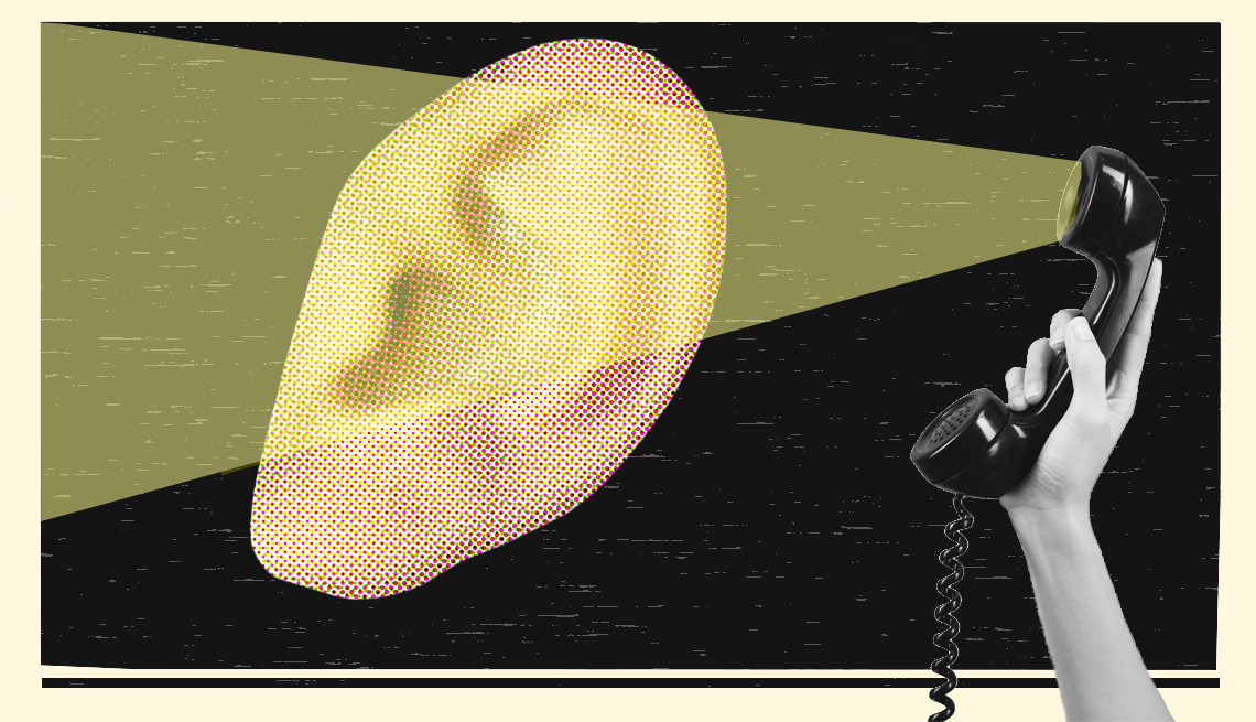 teleaudiology concept - telephone shining on an ear