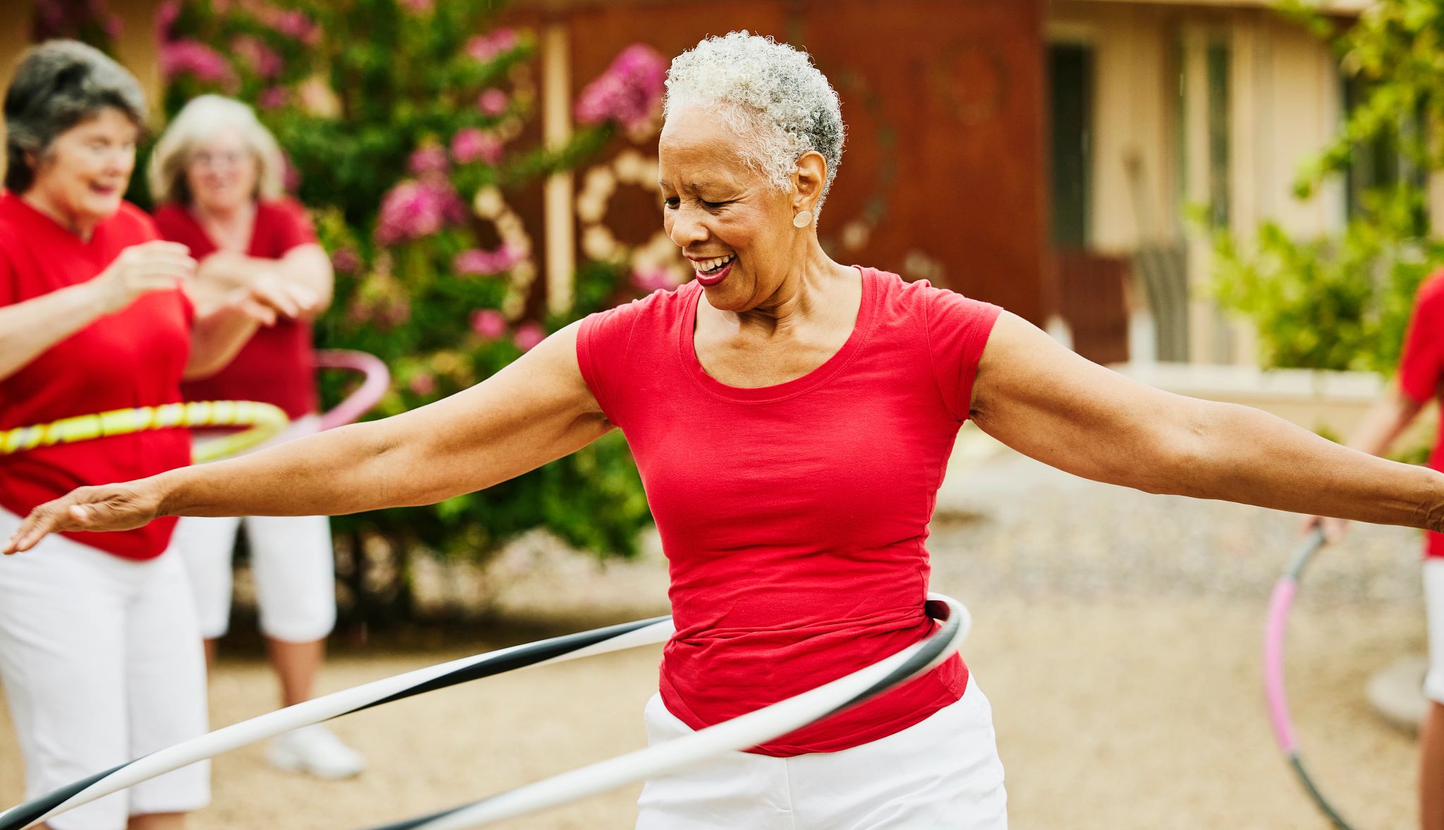 Vaccine Smart Guide woman hula hooping