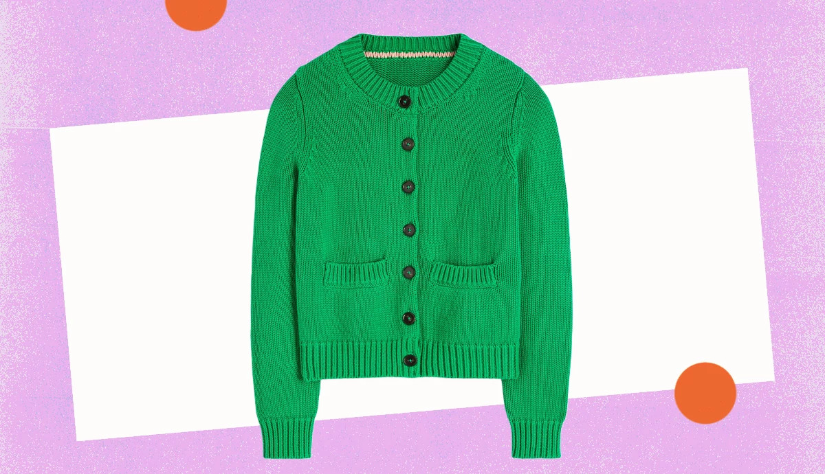 a bright green button front cardigan with pockets over a background with lavender and orange shapes