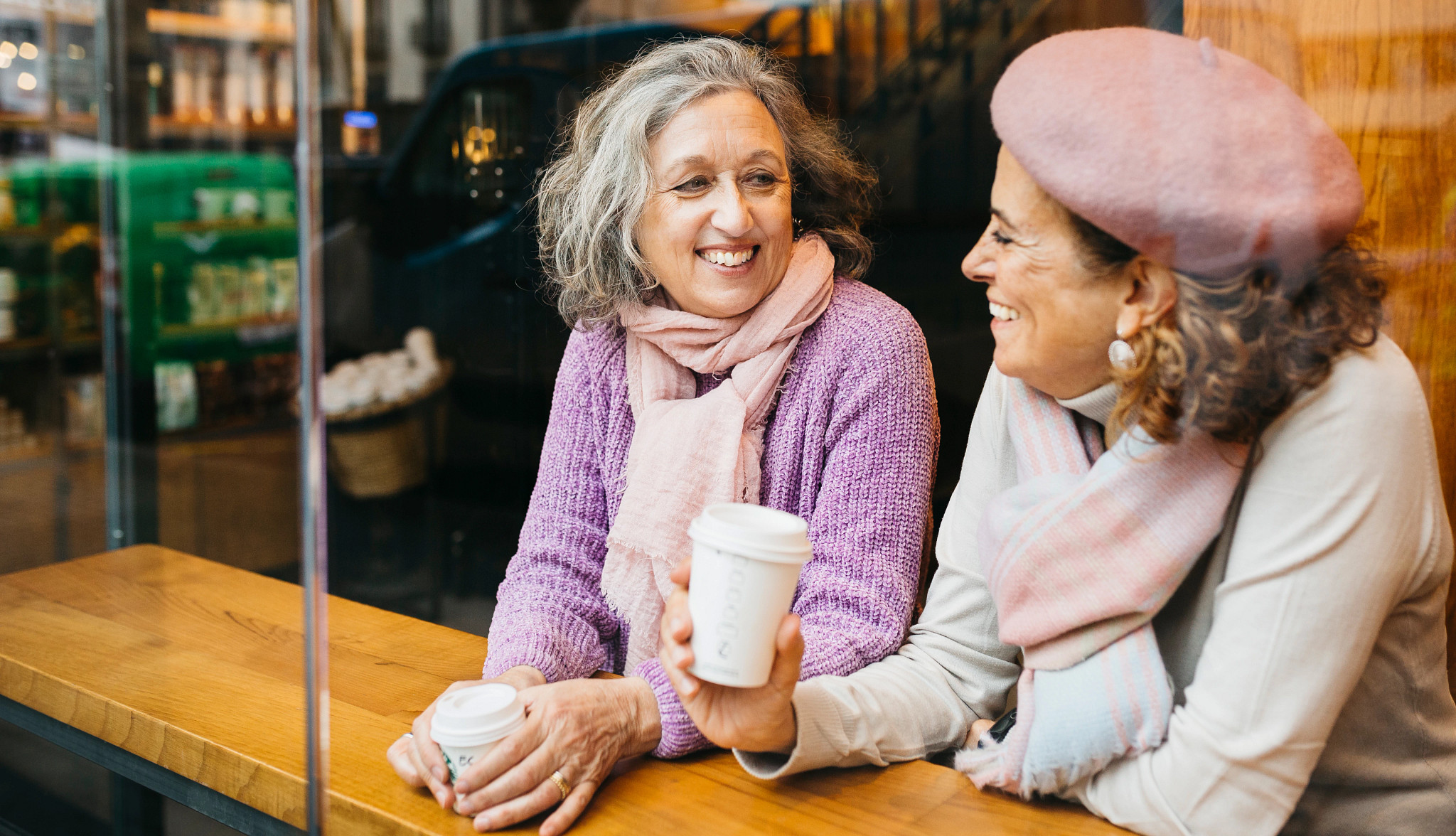 women chatting in a cafe