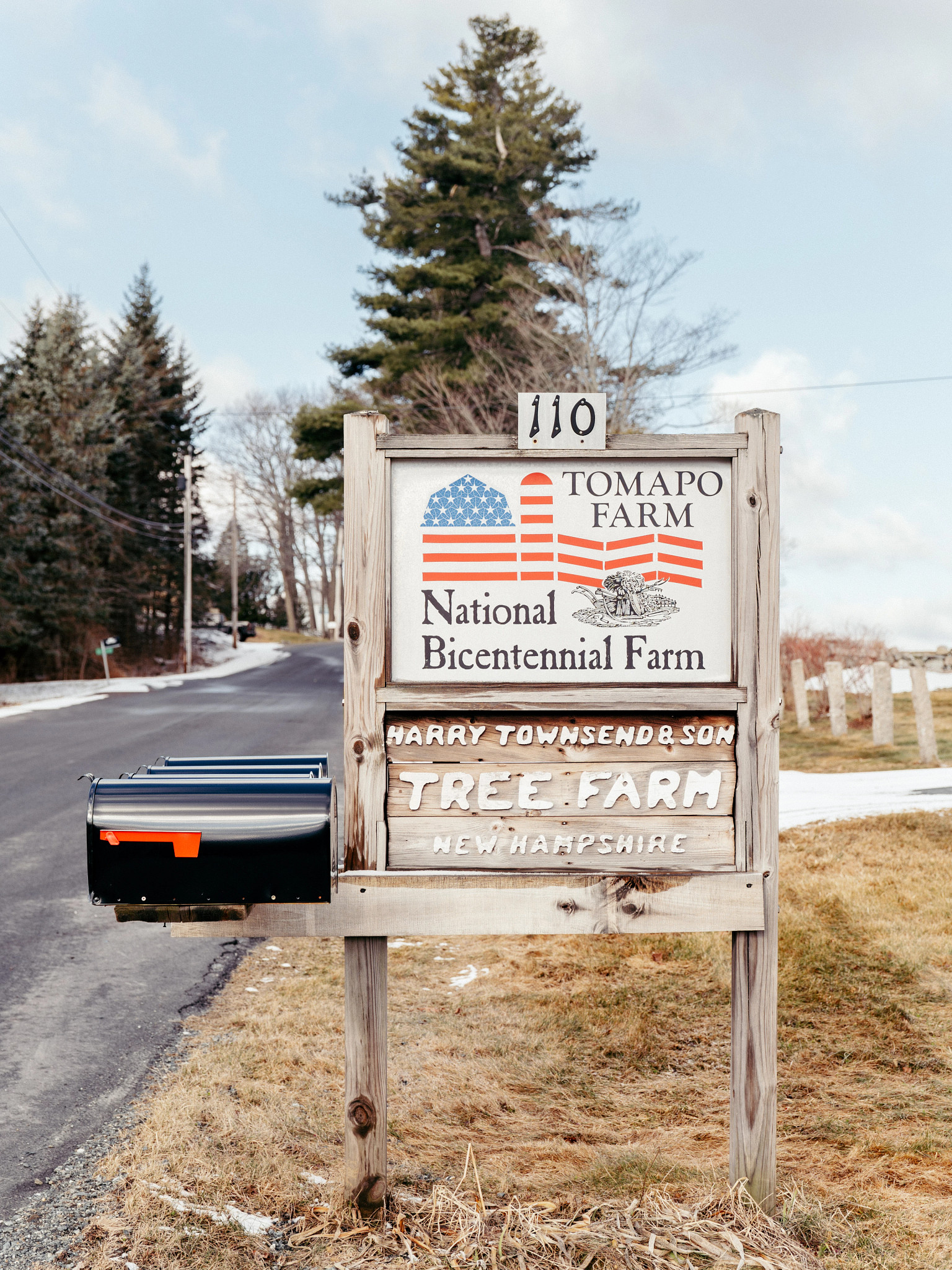 a sign near a farm