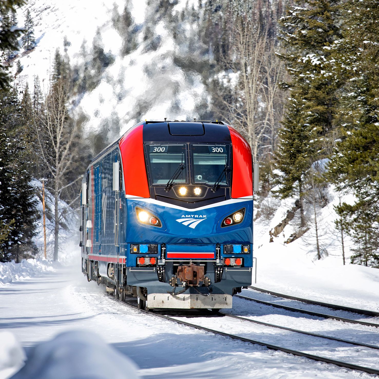 take Amtrak’s Empire Builder to Glacier National Park Amtrak’s Empire Builder traveling in the snow