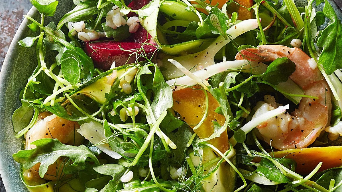 A close-up view of beet and shrimp winter salad