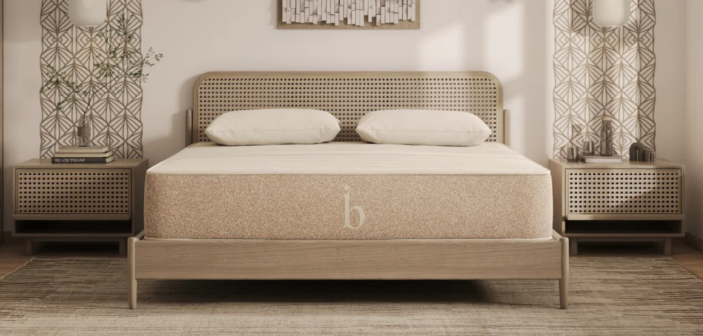 The Birch Natural Mattress on display in a beige room