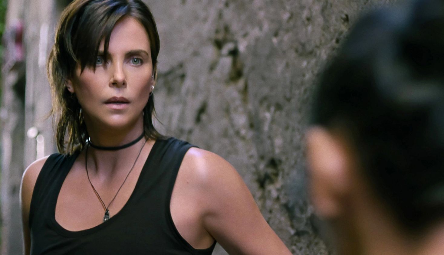 Charlize Theron on Turning 50 A photo shows Charlize Theron in the 2025 film 'The Old Guard 2.'