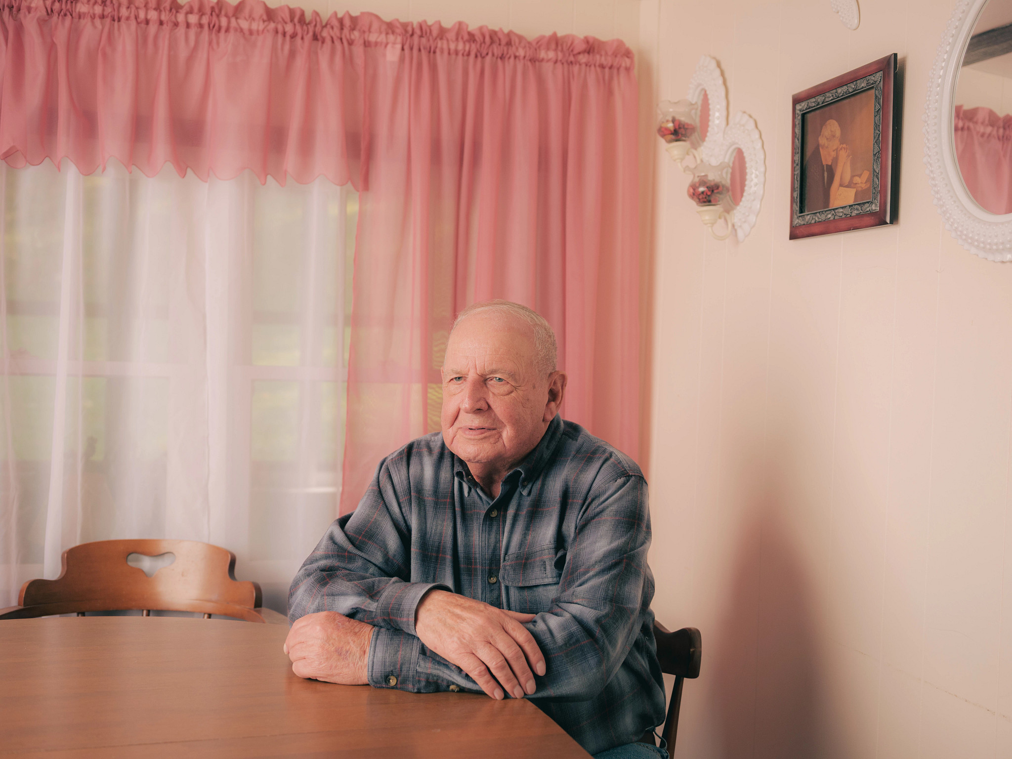 Voter Gerald Cline sitting at a table