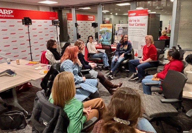 group of aarp pennsylvania women having a discussion in a circle