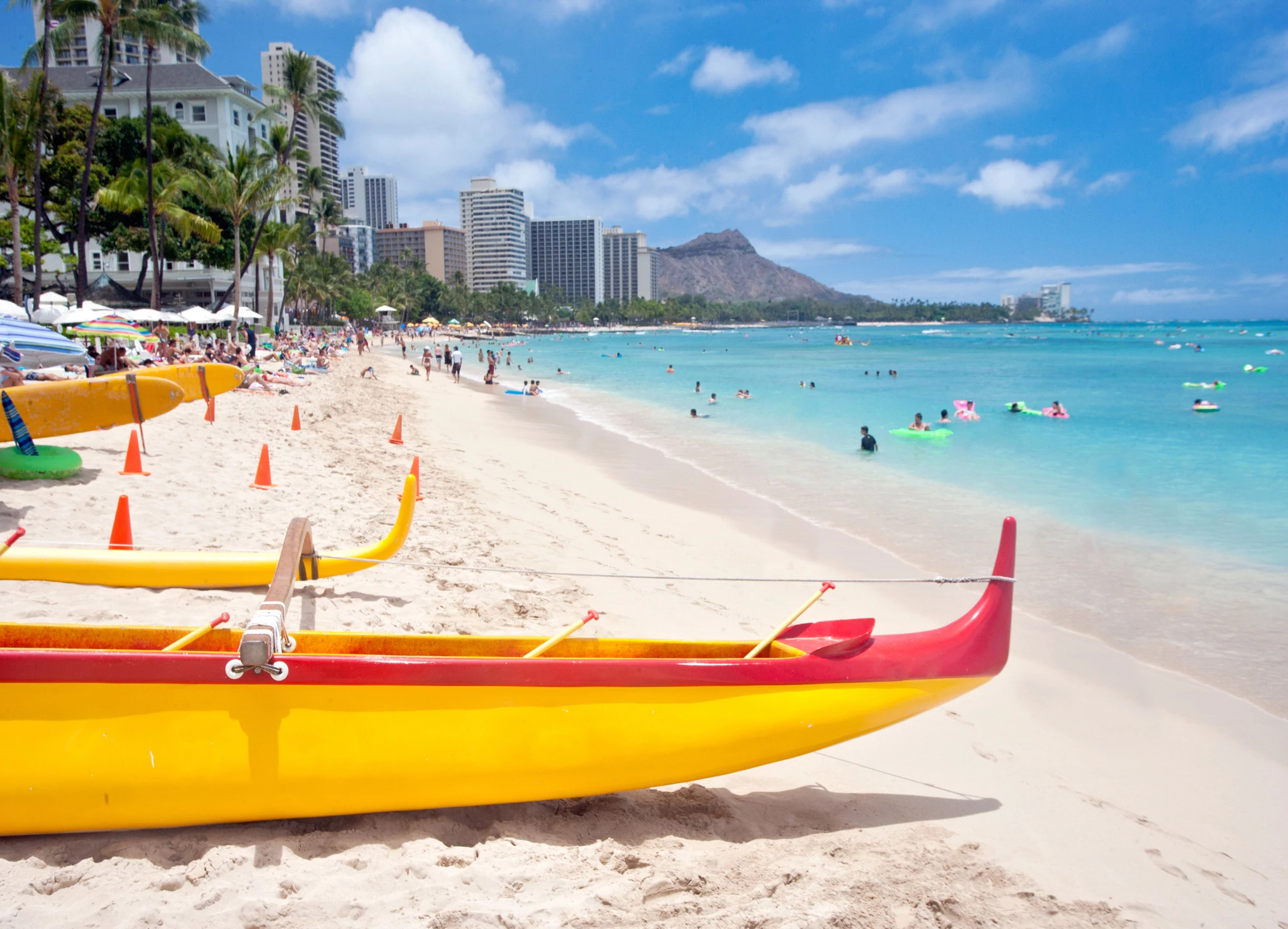 beachgoers in the ocean in Honolulu