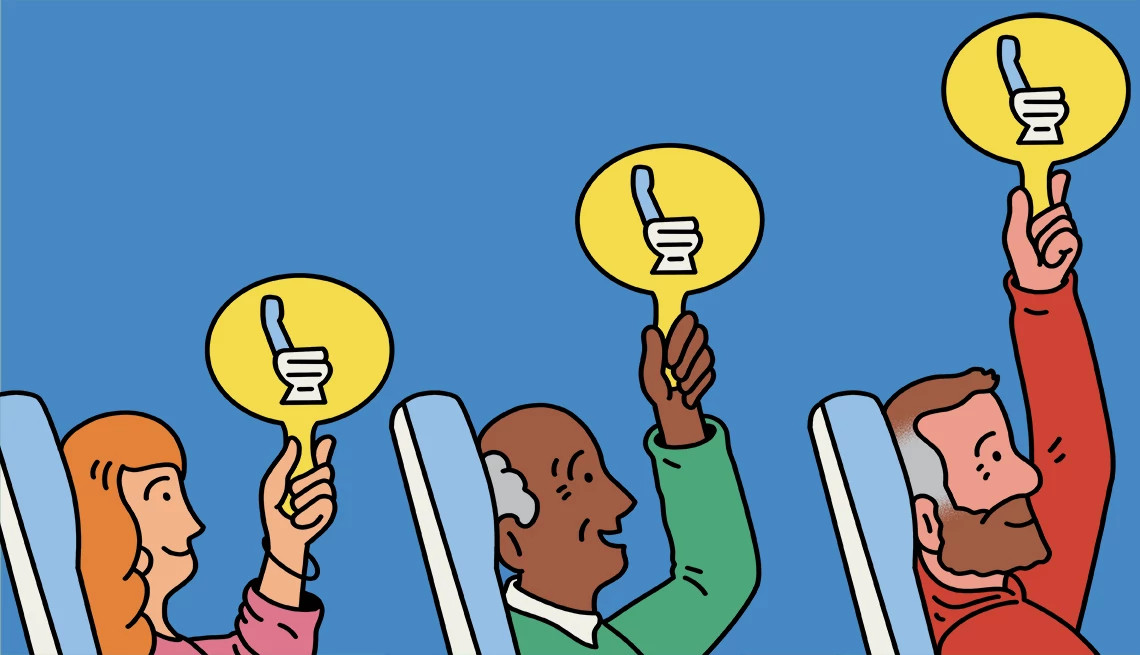 people holding up signs on a plane