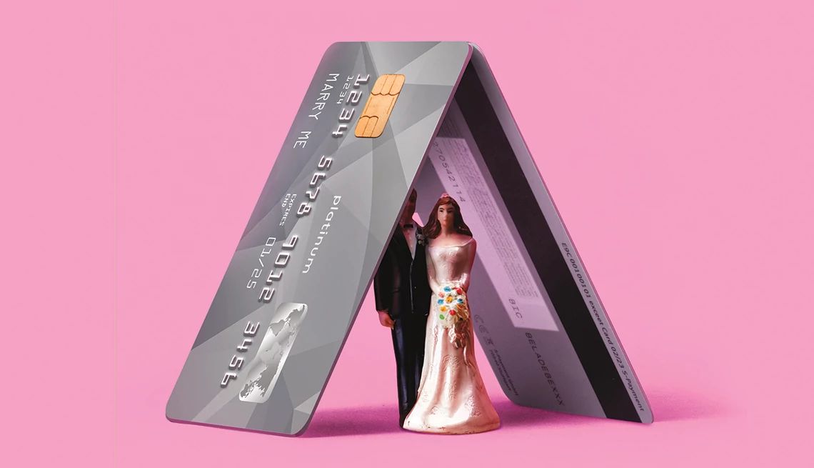 Financial Stability Concept Illustration of a house made from credit cards with a bride and groom figurine
