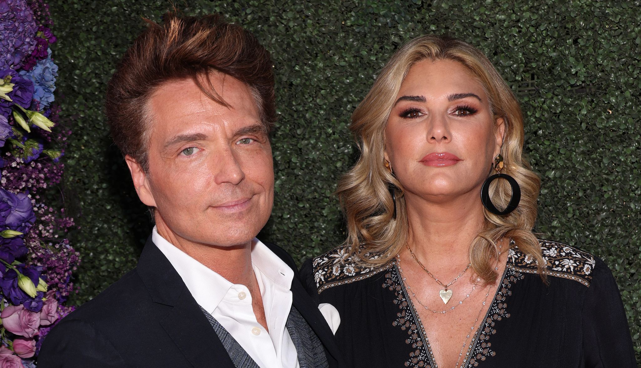 elegance of Richard Marx and Daisy Fuentes Richard Marx and Daisy Fuentes, a captivating duo, pose together