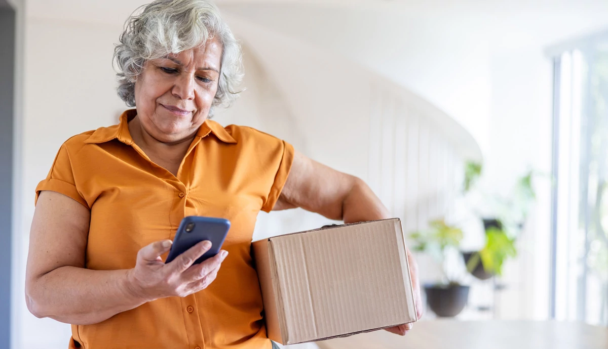 woman looking at smartphone