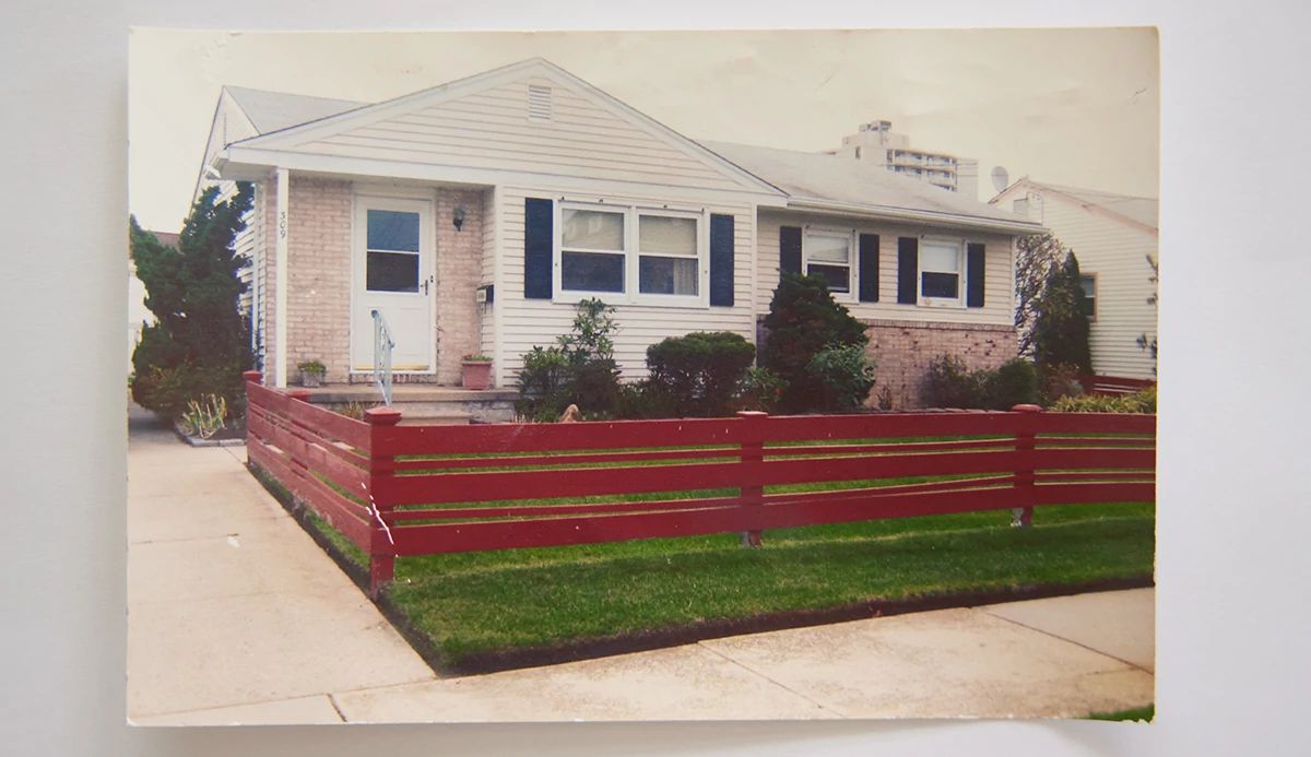 A house with a red fence