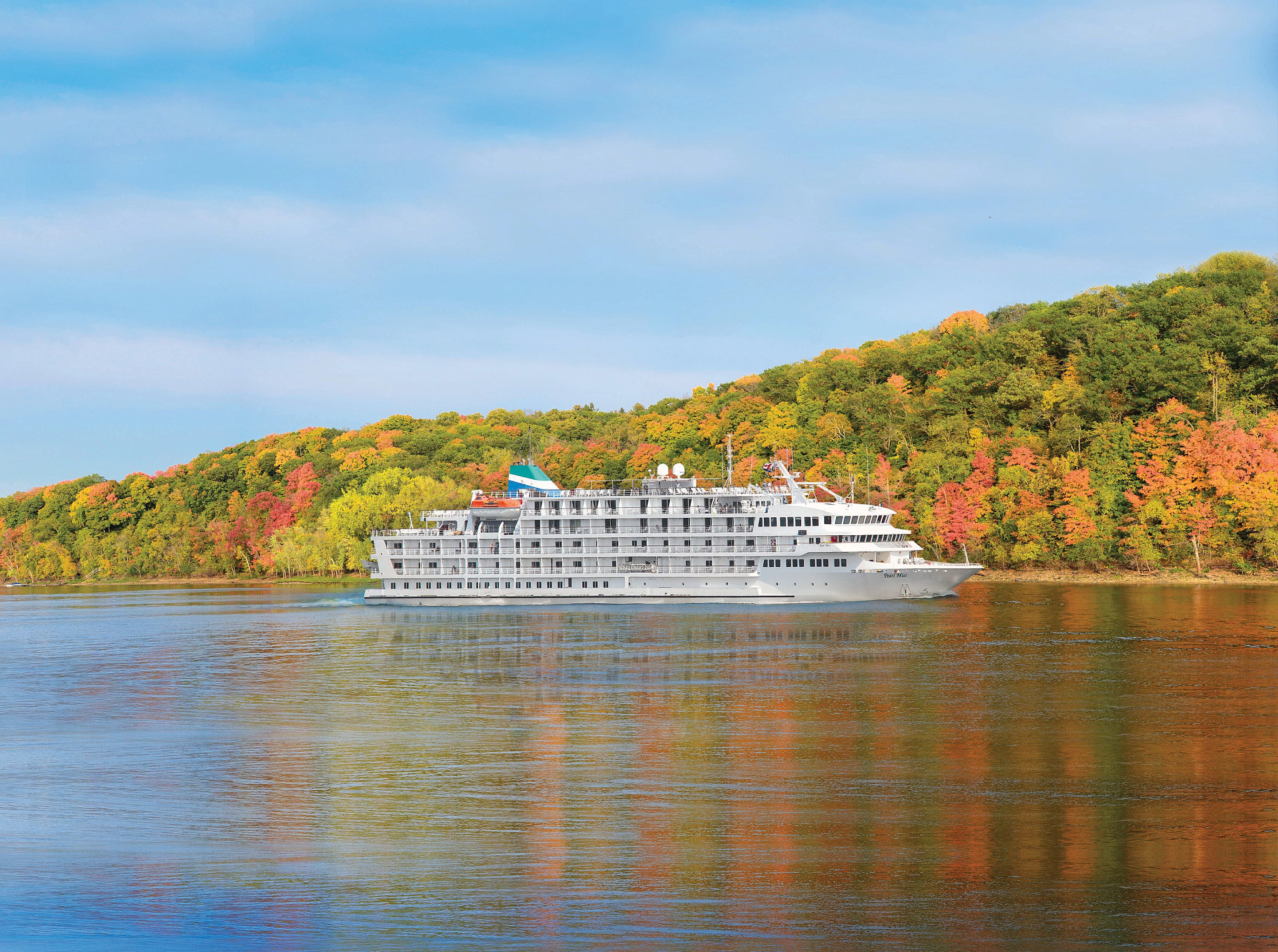 a cruise ship on a lake