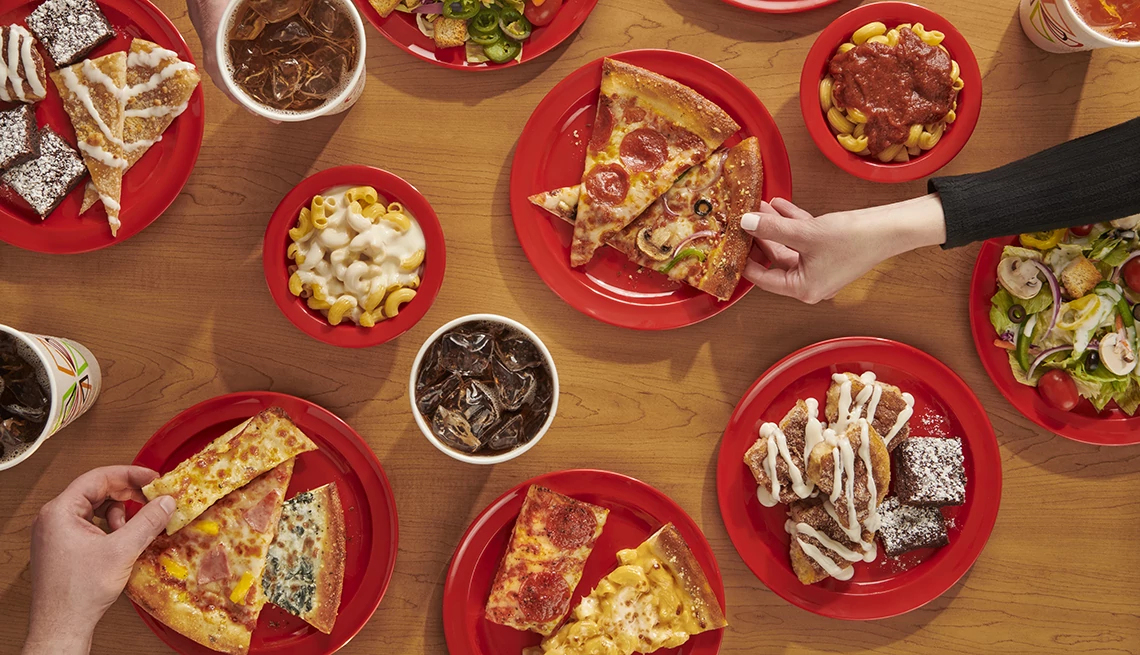 Cici's Pizza Menu items from Cici's Pizza displayed on table from an overhead view