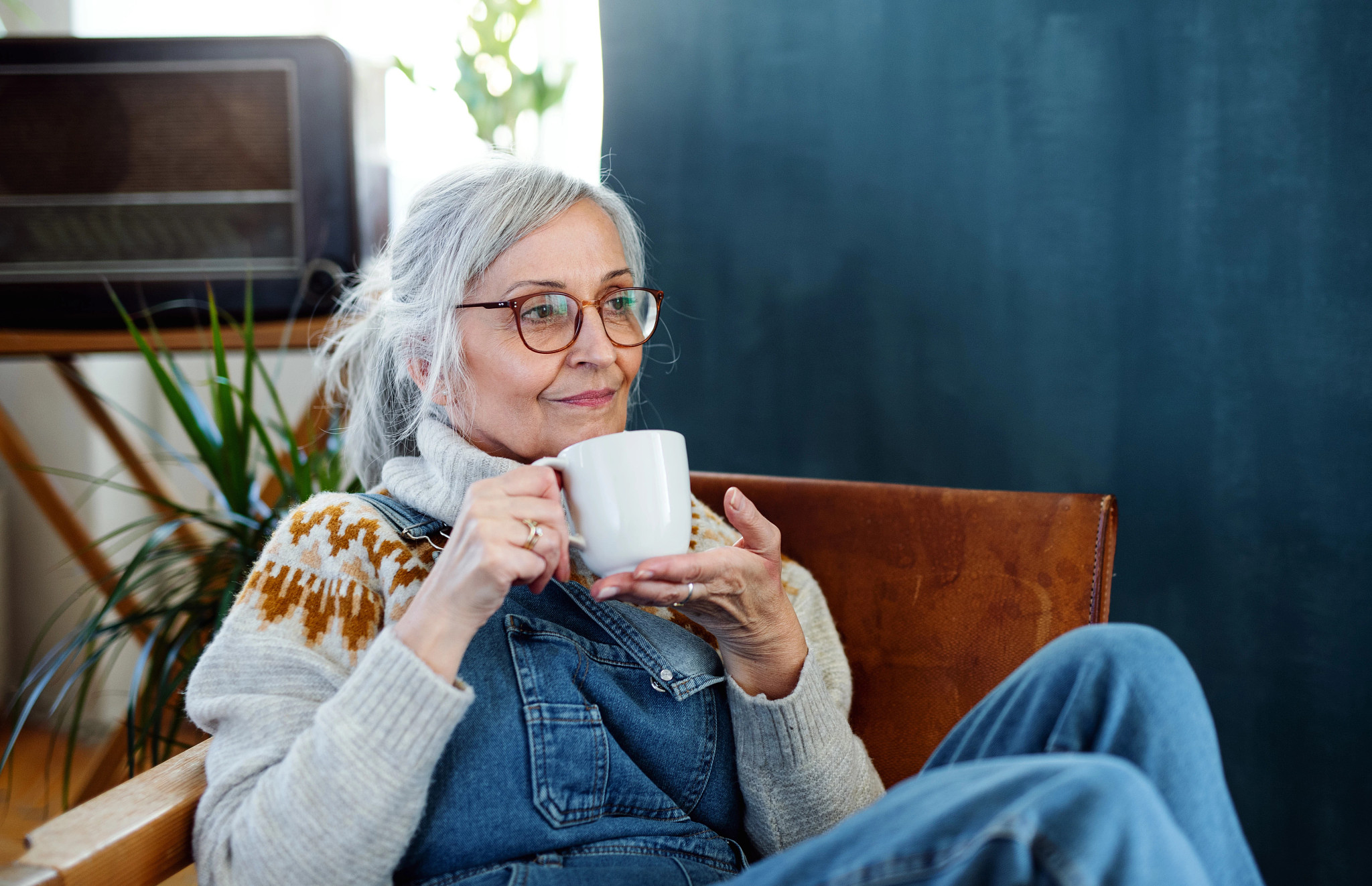 woman sitting with a mug