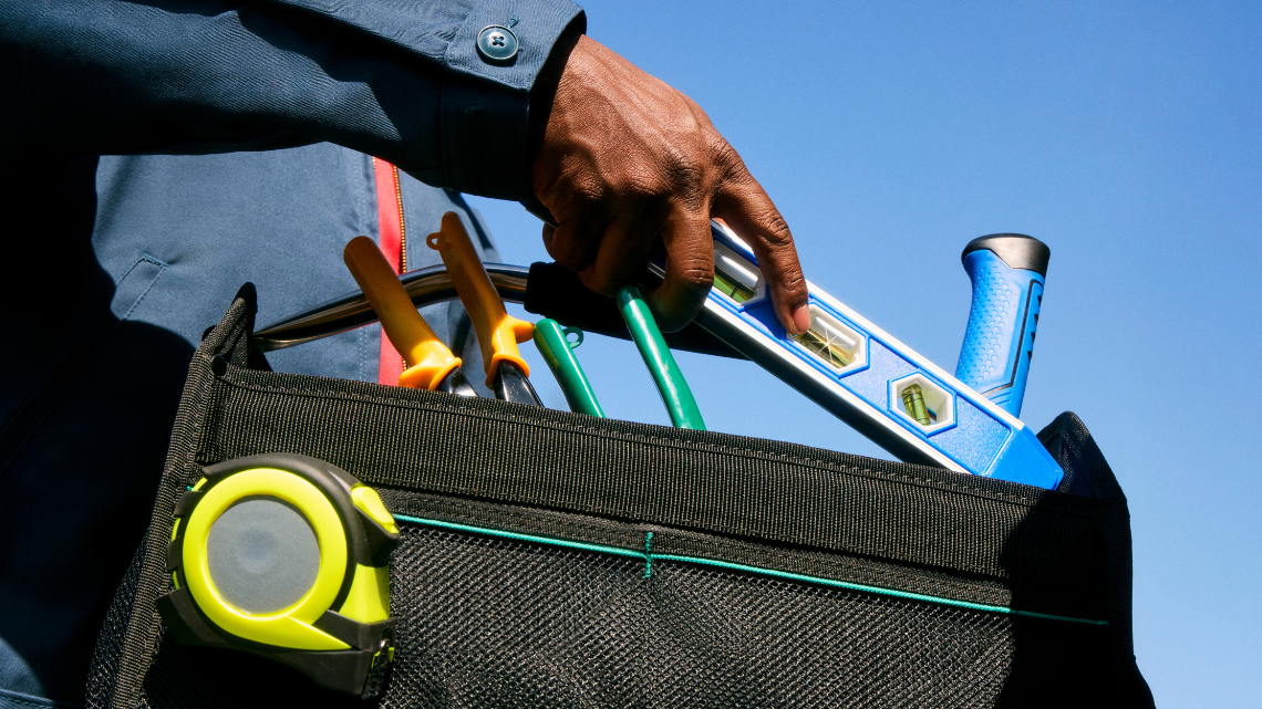Man holding a tool box