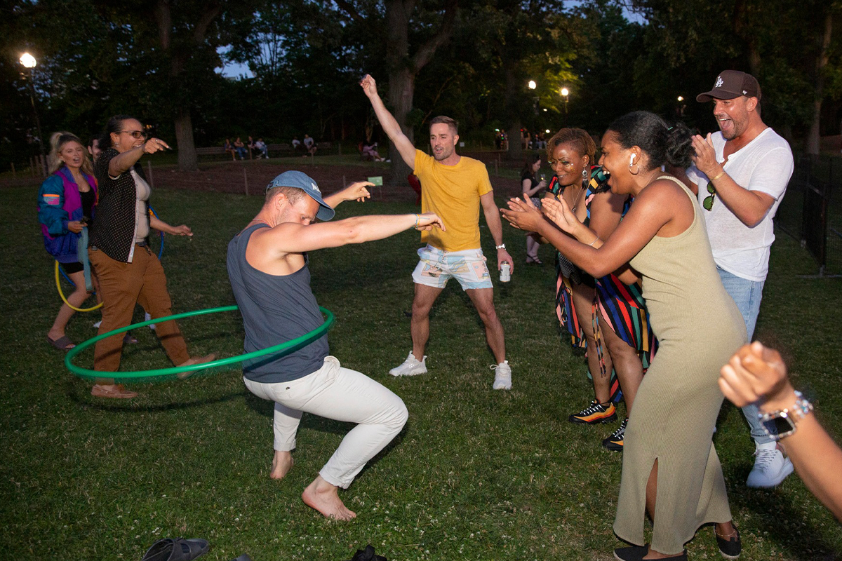 people dancing at a party at the zoo