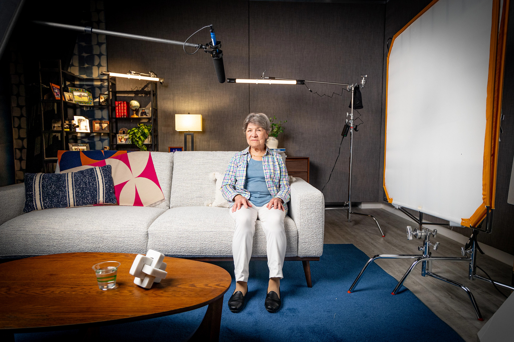 a person being interviewed on a couch