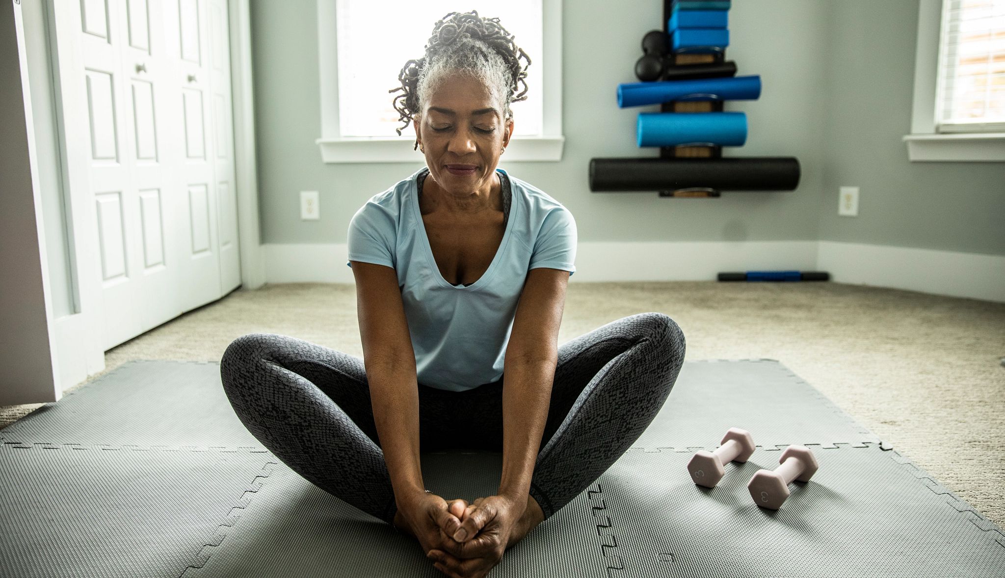 Guide to Kidney Health woman exercising on the floor