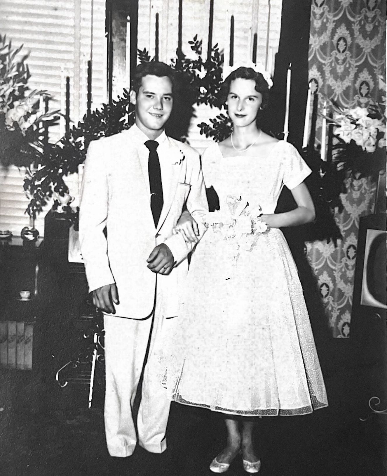 The Night My Mom Met Elvis two young people posing for a wedding portrait