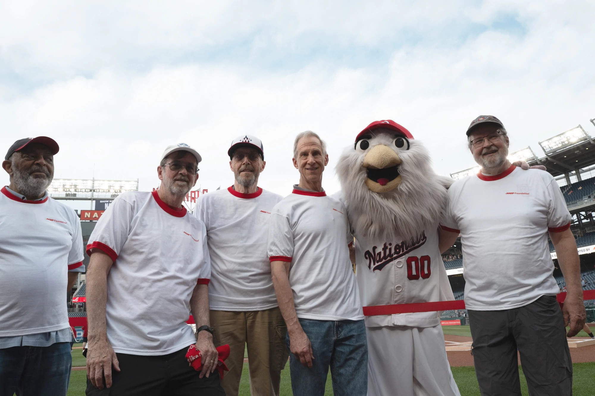 a photo shows AARP Foundation donors at the start of the Washington Nationals game.