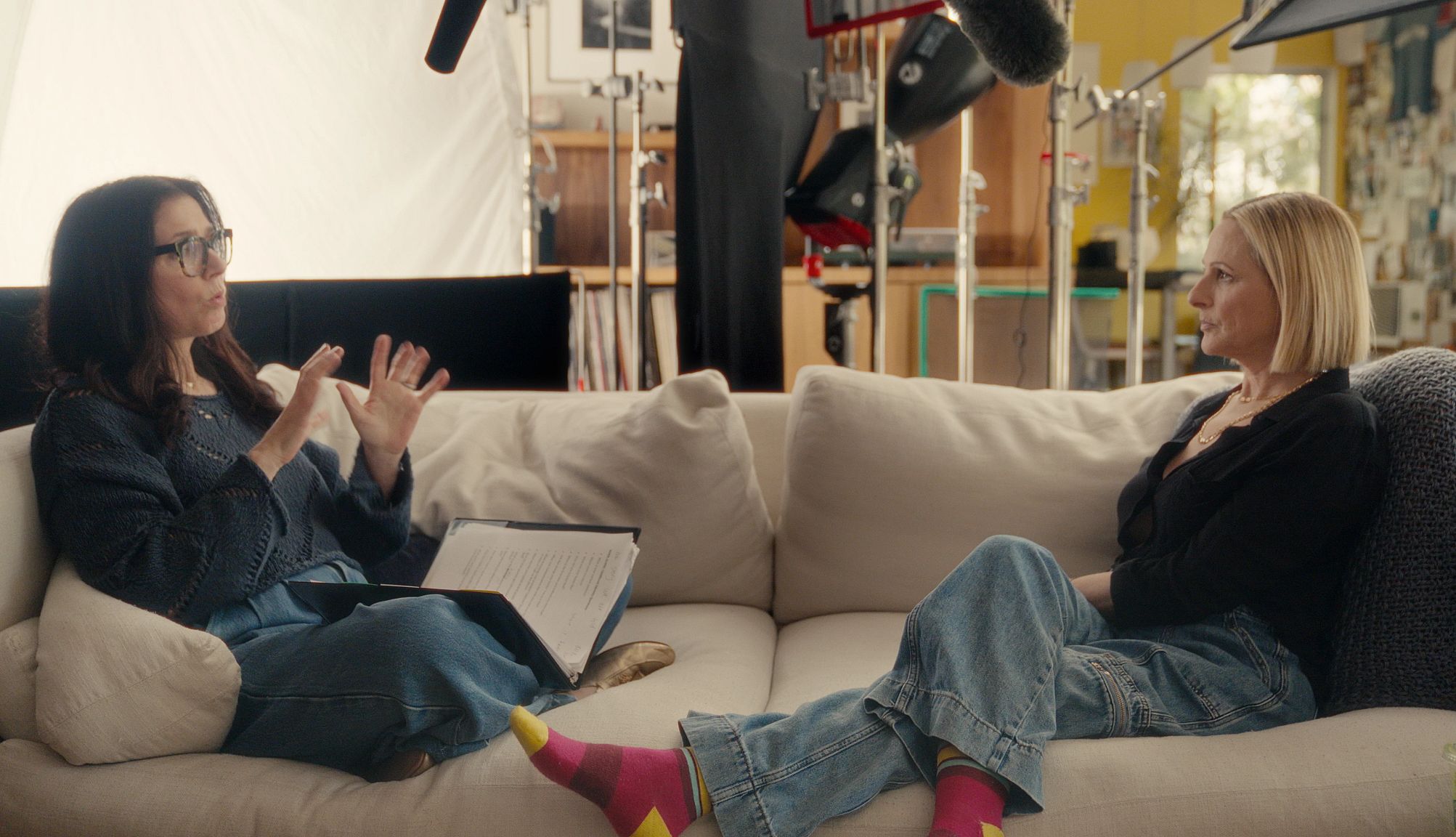 Marlee Matlin Isn't Holding Back Marlee Matlin sits on a sofa facing Shoshannah Stern as they engage in a conversation.