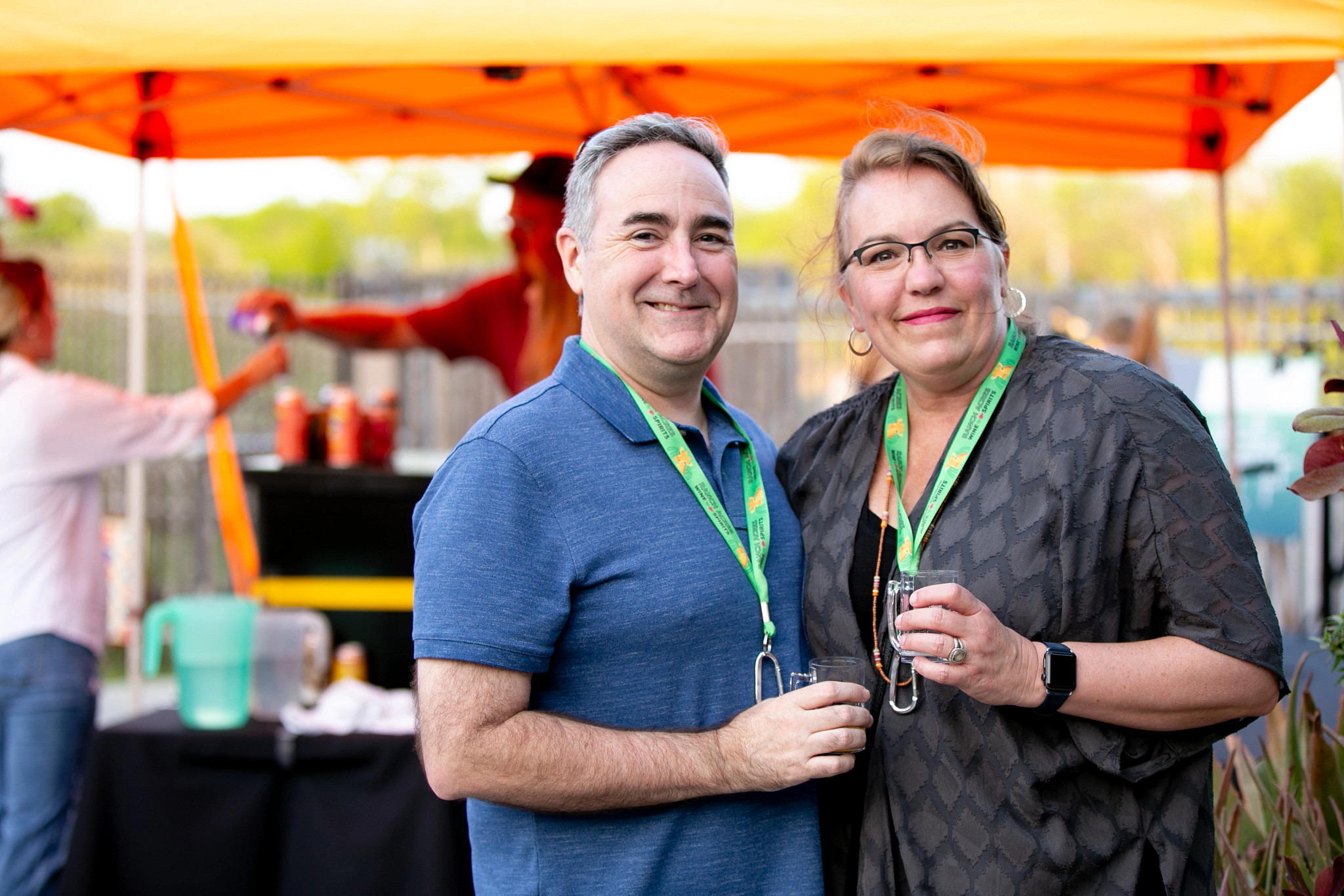 people walking around the zoo