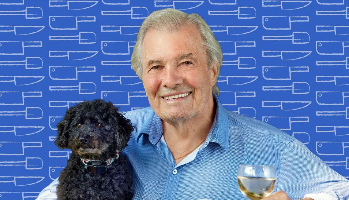 Chef Jacques Pépin shares new recipes Jacques Pépin holding dog and glass of wine against blue background with outlines of knives and spatulas