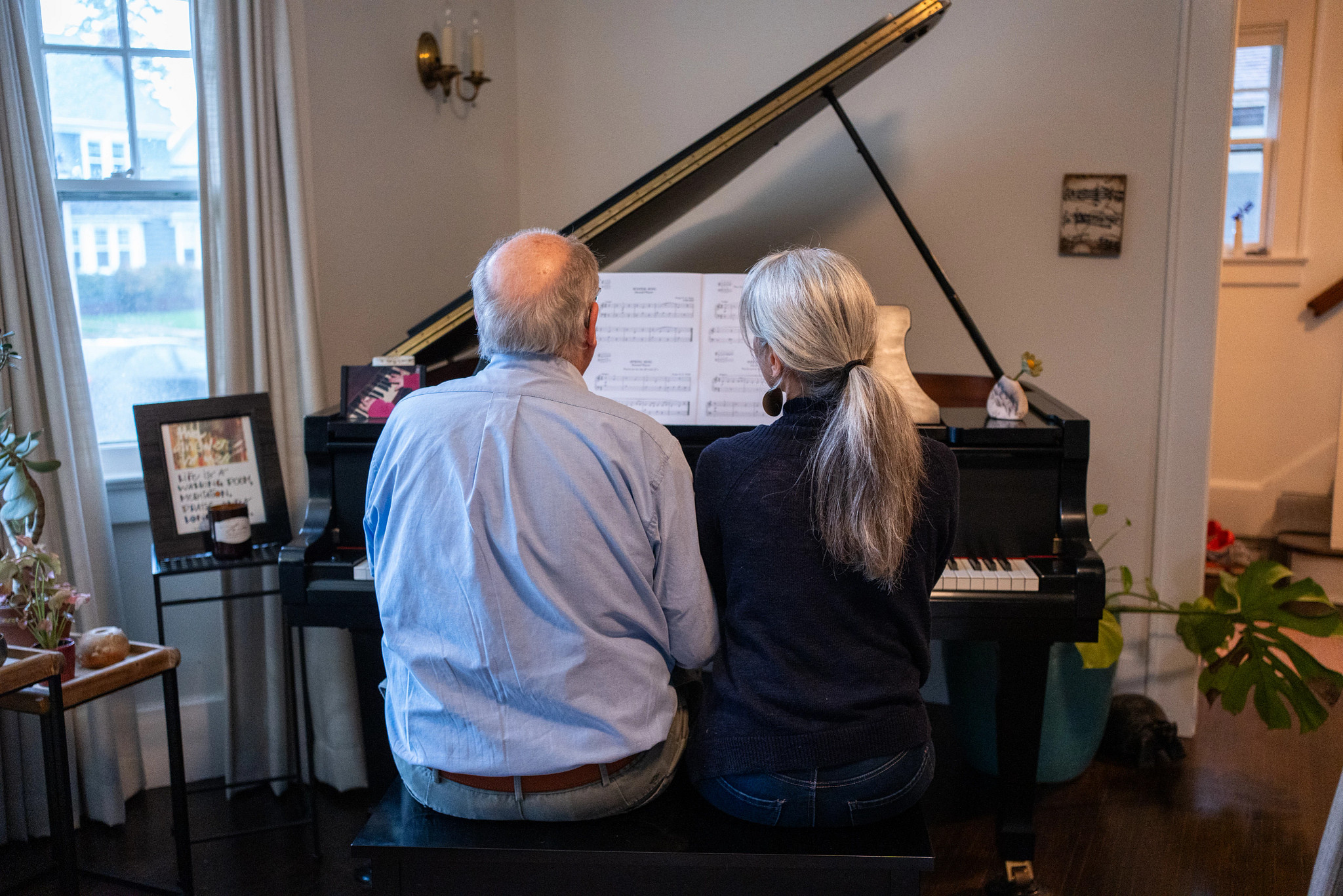 Bonn and Flanigan go over a sheet of music