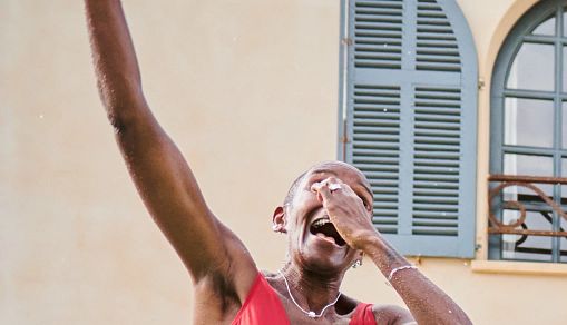 Having fun A group of women jumping into a pool