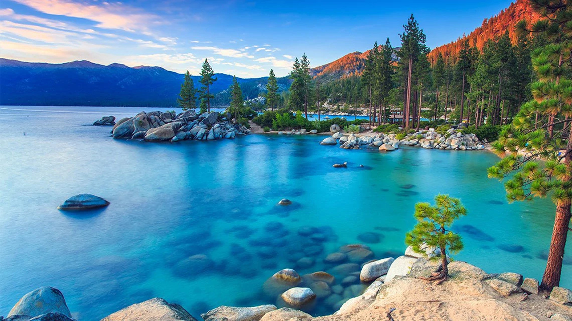 lake tahoe mountains water and trees