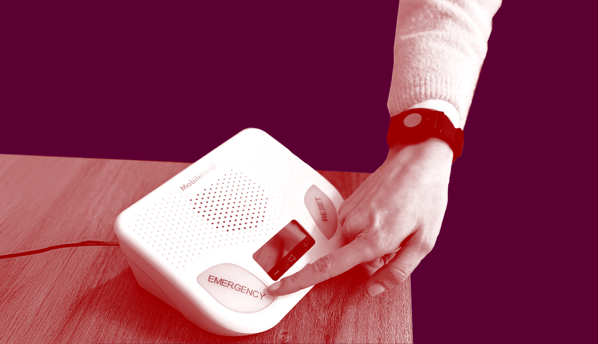 Tester presses button on medical alert system
