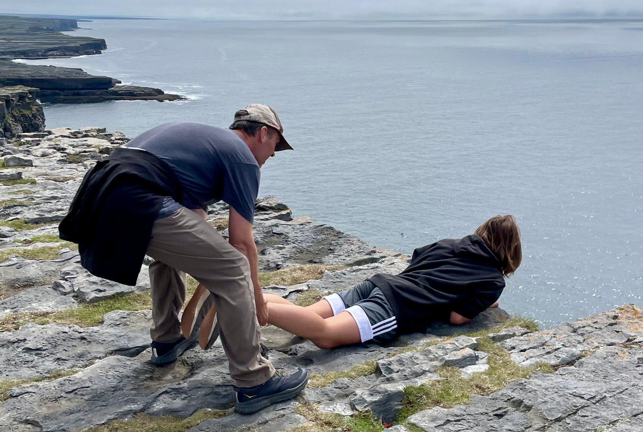Heather Mundt's husband and son get a close up view of an overlook at Galway Bay