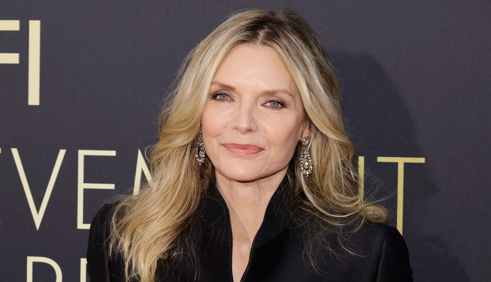 Michelle Pfeiffer First-Time Grandmother michelle pfeiffer poses for a picture at an event