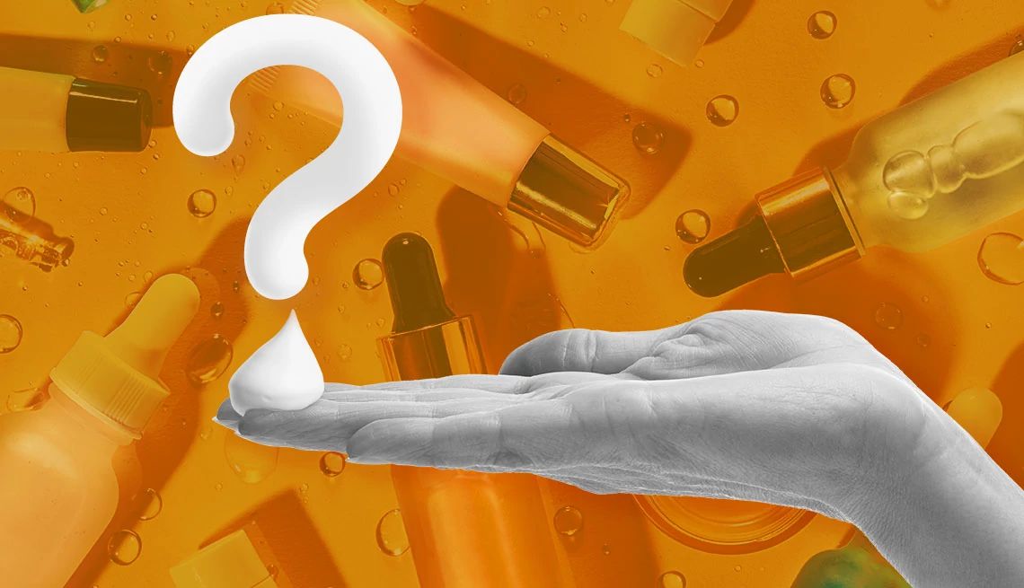 A woman's hand with a question mark shaped by lotion above it A woman's hand with a question mark shaped by lotion above it