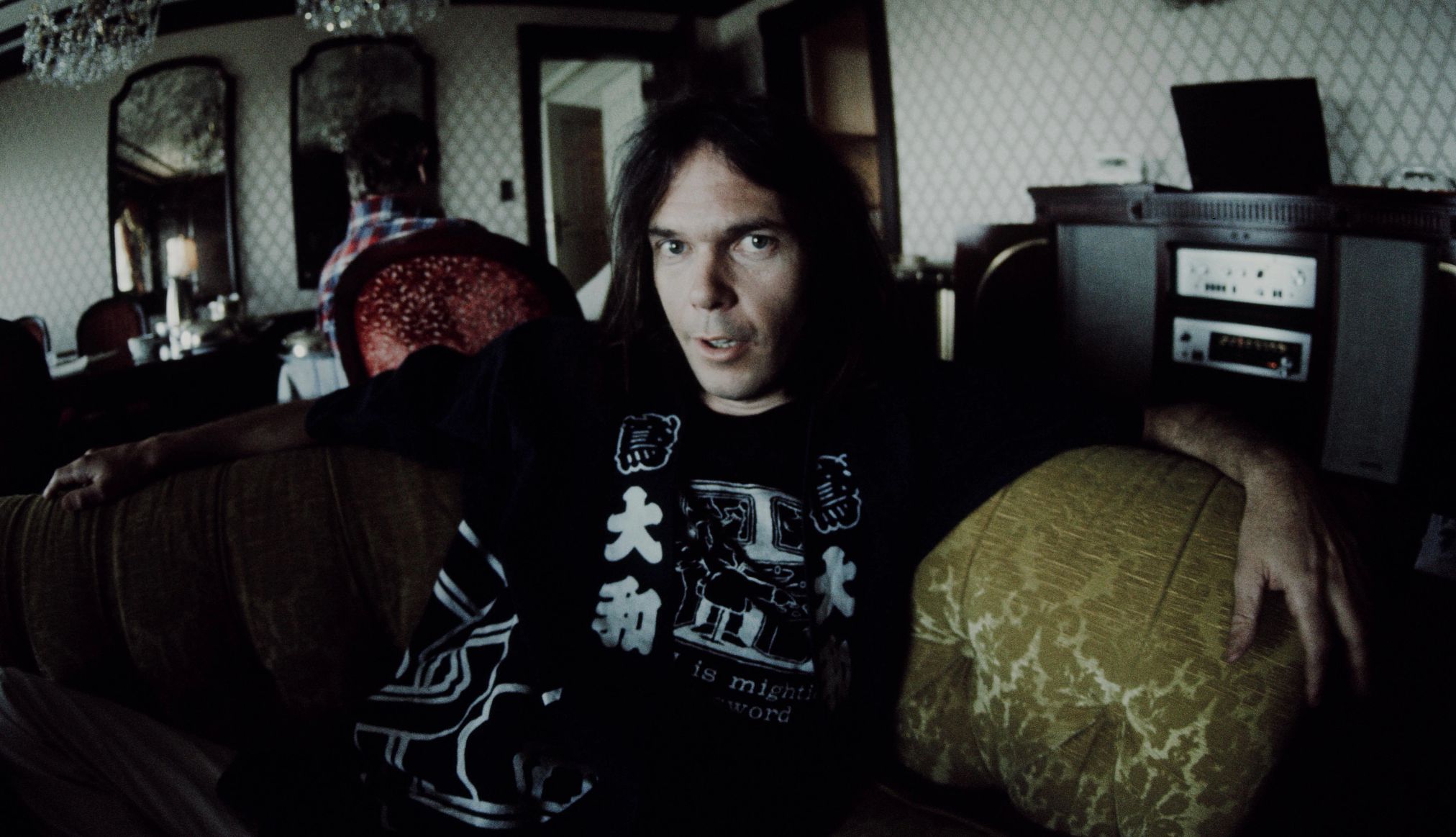 Neil Young Neil Young in happi-coat relaxing at a hotel in Tokyo in March 1976