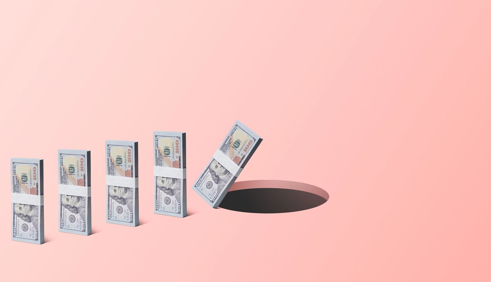 Older Adults Hit Hard by Scams groups of one hundred dollar bills falling down a hole